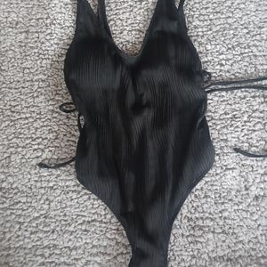 Sleek Black Ribbed One-Piece Swimsuit